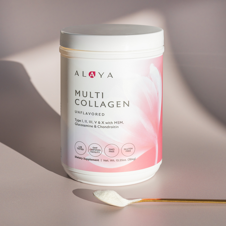 Alaya Multi Collagen Unflavored Powder supplement bottle on a dusty pink background with a gold spoon and powder #flavor_unflavored